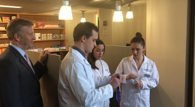 UB Pharmacy students give demonstration on how to use Deterra Drug Deactivation System.